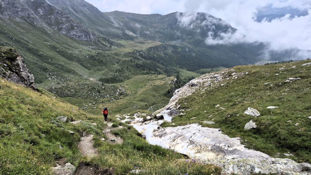 one person trekking in the alps near Cheneil in the Valtournenche area